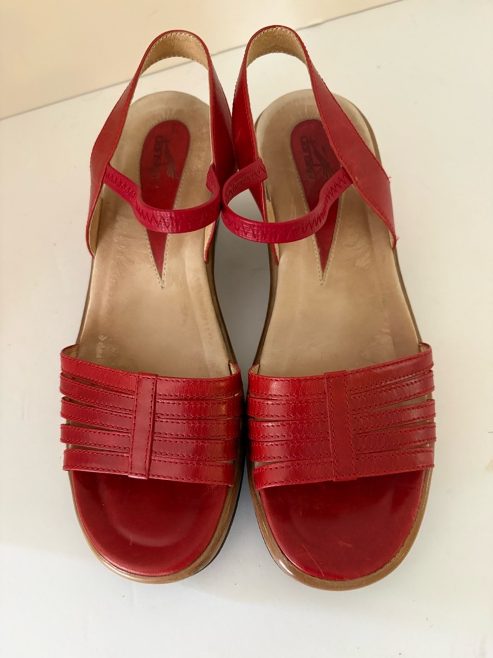 Dansko red leather strap sandals. Size 7.5/8. Wedge heel, open toe. Very nice!